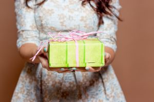 woman presenting gift